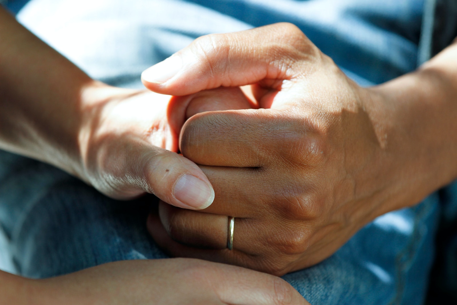 Photo by National Cancer Institute person wearing gold wedding band