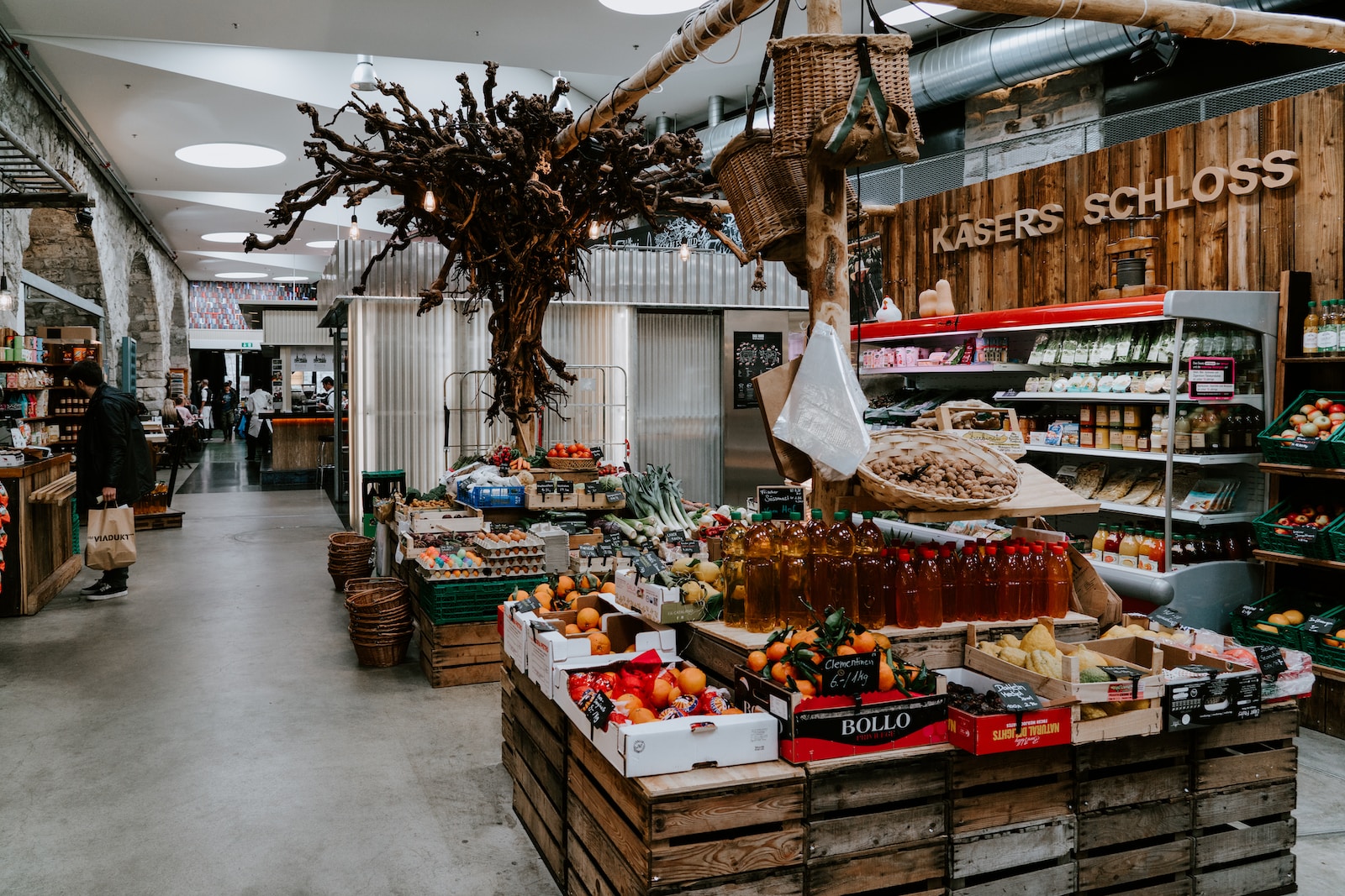 Photo by Claudio Schwarz assorted fruits displays on pallets